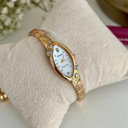 Orient Lady Rose rose gold tone women’s watch with mother of pearl dial and crystal bracelet