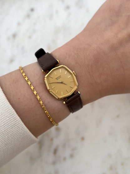 Seiko Gold Toned Woman's Watch with Enamel Accent