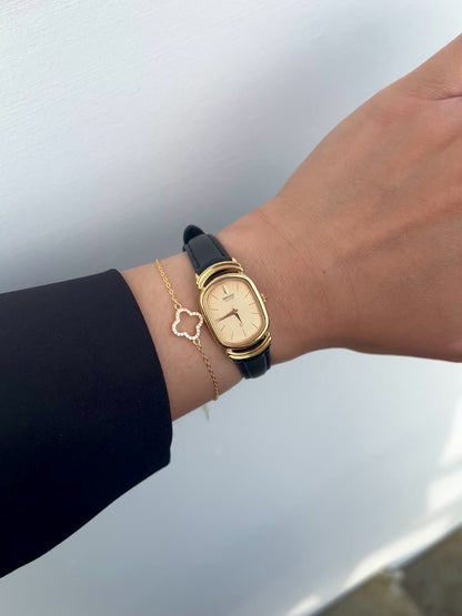 Seiko Gold Tone Oval Watch with Twin Ring Lugs