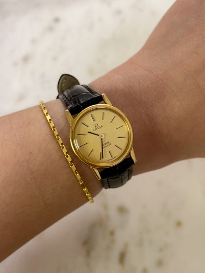 Omega Round Gold Toned Woman's Watch