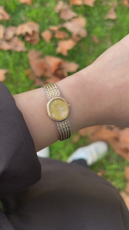 Seiko Gold Toned Oval Watch with a Wreath Textured Case