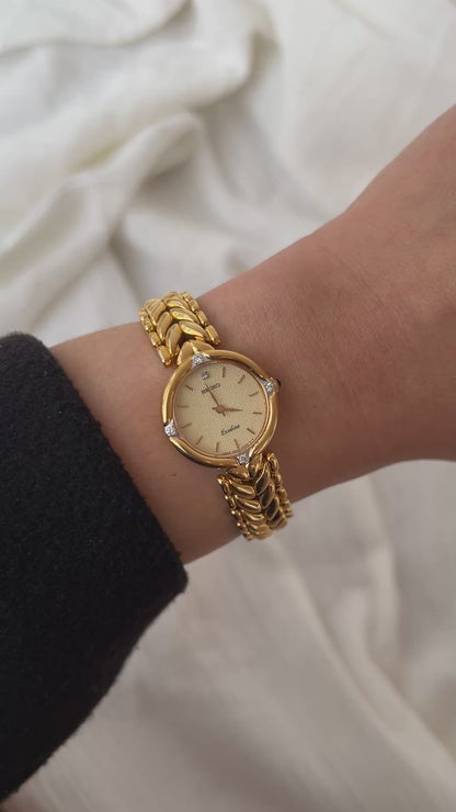Seiko Exceline Woman's Watch with Diamonds and Dragon Pattern Bracelet