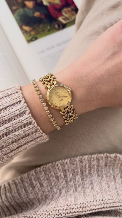 Seiko Belfina Gold Toned Watch with Intricate Bracelet