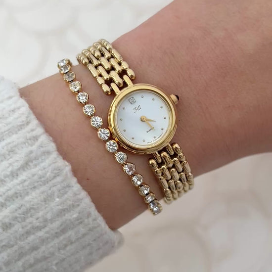 Vintage Citizen Fill ladies gold-tone bracelet watch with white dial and crystal accent