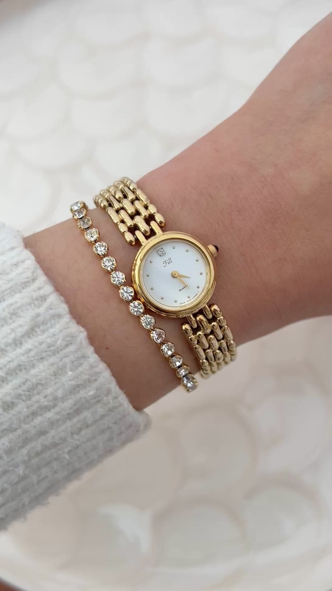 Vintage Citizen Fill ladies gold-tone bracelet watch with white dial and crystal accent