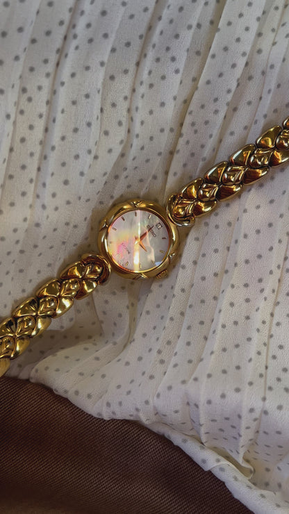Seiko Exceline Gold Toned Woman's Watch with Radiant Mother of Pearl Dial