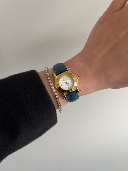 Gucci Gold Toned Ladies Watch with Roman Bezel and Textured Dial