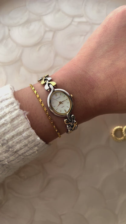 Seiko Lucent Woman's Watch with a Pink Pearlescent Dial