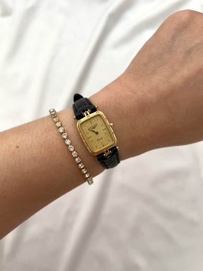 Longines Gold Toned Rectangular Womans Watch with Intricate Details