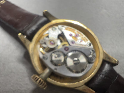 Longines Gold Toned Round Woman's Watch