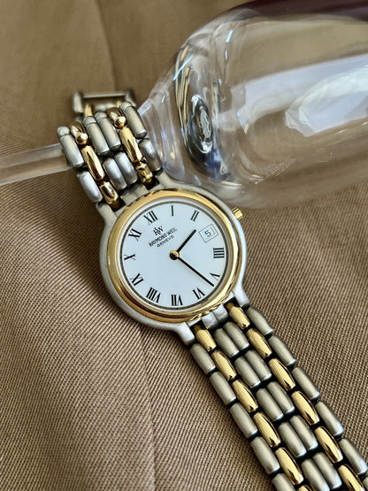 Angled view of Raymond Weil Fidelio watch showing dark hands and date window at three