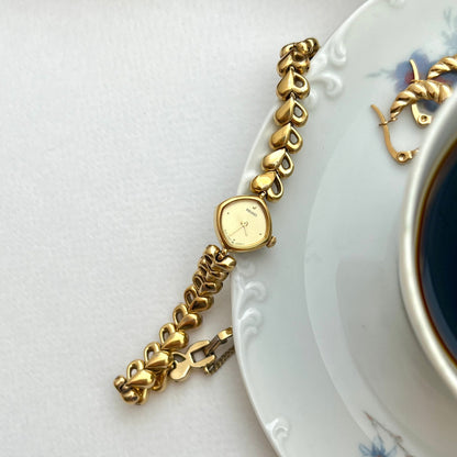 Seiko Gold Toned Women's Watch with Hearts Bracelet, bracelet detail of a vintage women's watch at Gilded Hour.