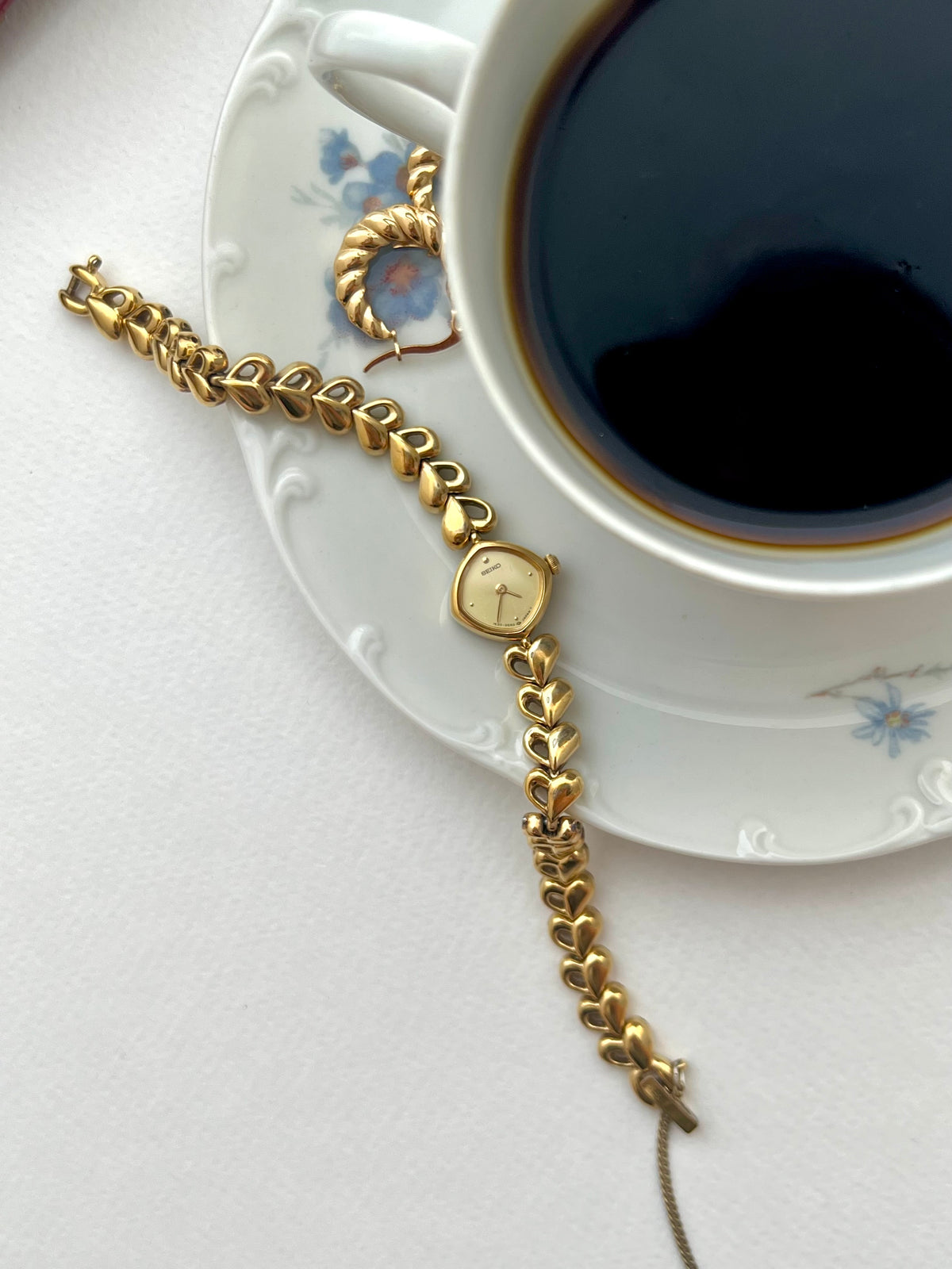 Seiko Gold Toned Women's Watch with Hearts Bracelet, wrist shot of a vintage women's watch at Gilded Hour.