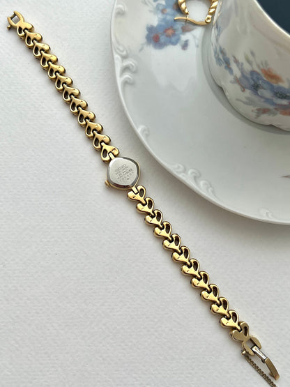 Seiko Gold Toned Women's Watch with Hearts Bracelet, product photograph 9.