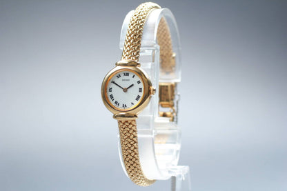 Seiko 1F20-0A40 gold-tone bracelet watch with white Roman numeral dial