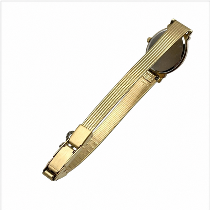 Side view of the Seiko 2P21-5D10 showing its gold-tone woven bracelet and slim case