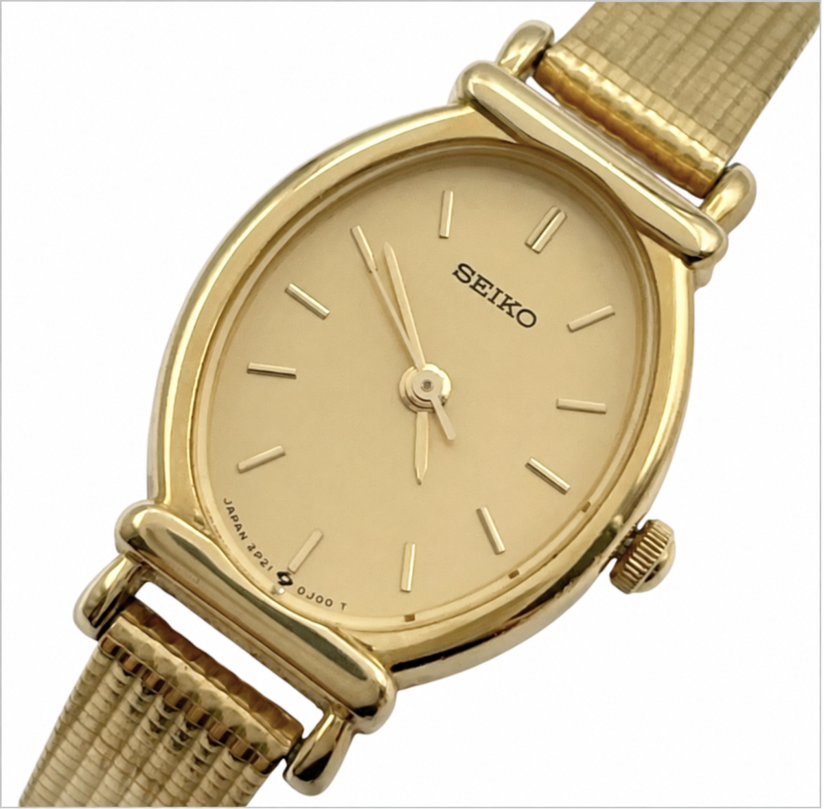 Front view of the Seiko 2P21-5D10 gold-tone watch with champagne dial and applied baton markers