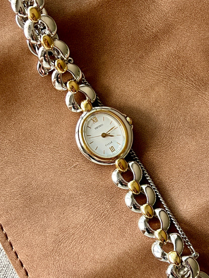 Seiko Tissé White Dial Sculpted Two Tone women's watch — product photograph 2