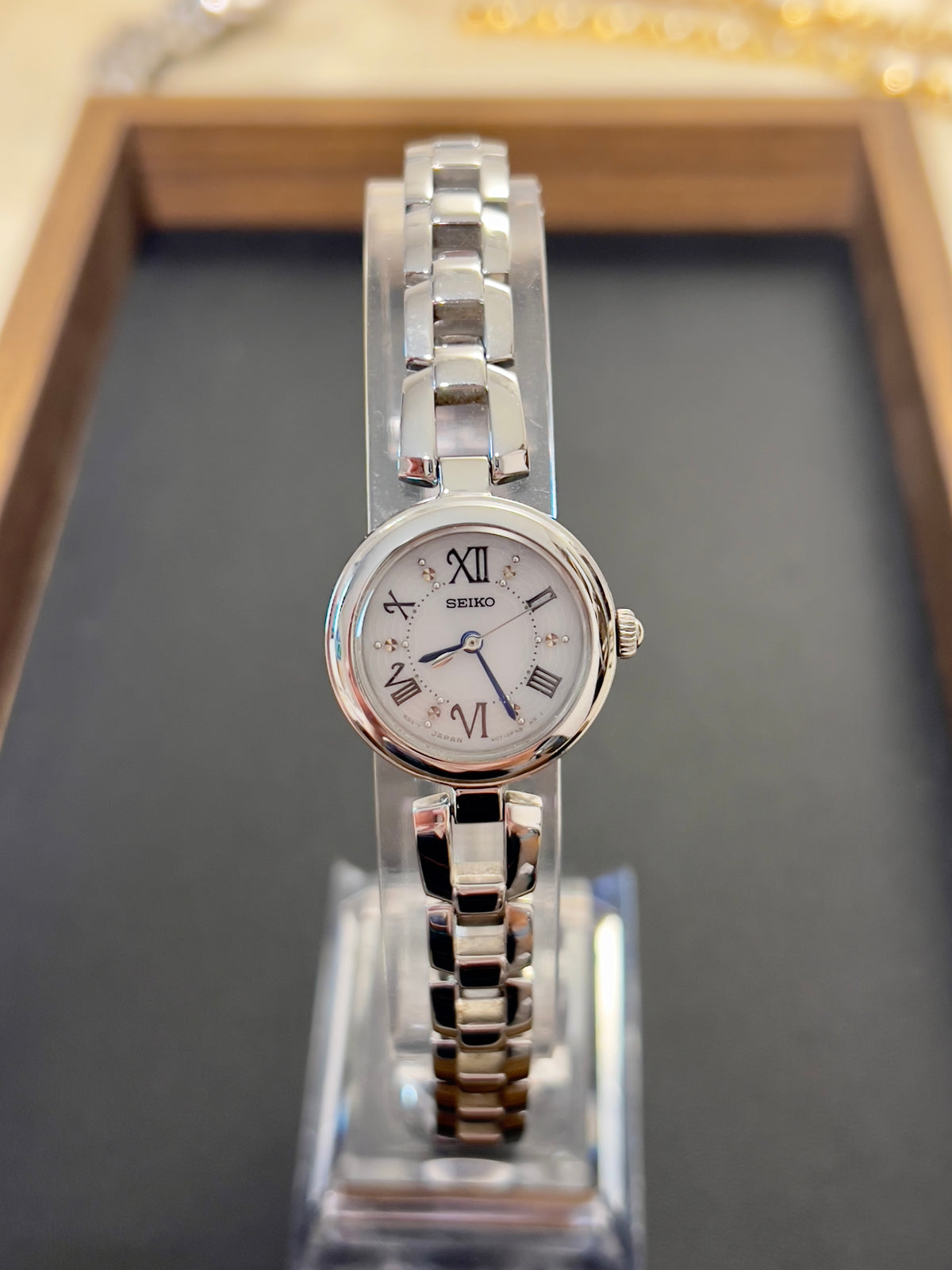 Seiko Tissé Solar White Dial Blue Hands Women's Watch — product photograph 2