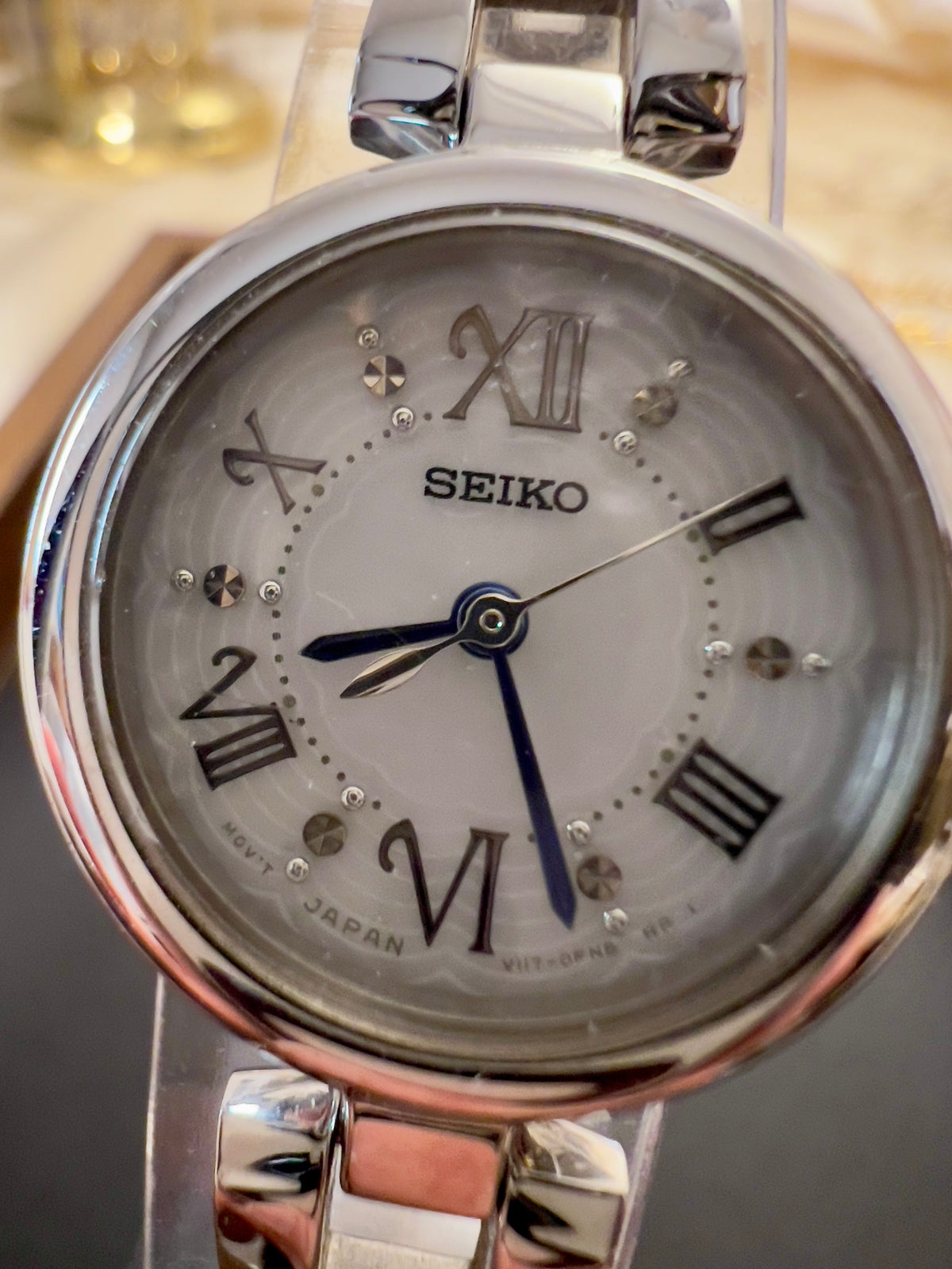 Seiko Tissé Solar White Dial Blue Hands Women's Watch — product photograph 4