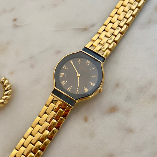 Seiko Lassale Black and Gold Woman's Watch, wrist shot of a vintage women's watch at Gilded Hour.