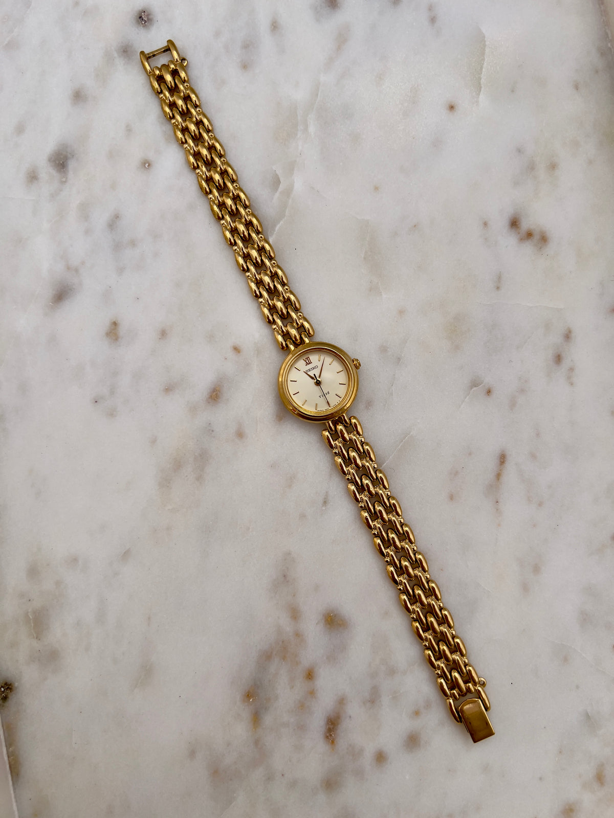 Seiko Tisse Gold Toned Women's Watch, caseback detail of a vintage women's watch at Gilded Hour.