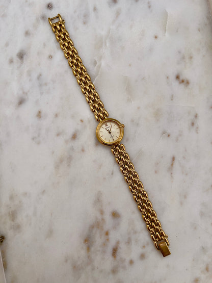 Seiko Tisse Gold Toned Women's Watch, caseback detail of a vintage women's watch at Gilded Hour.