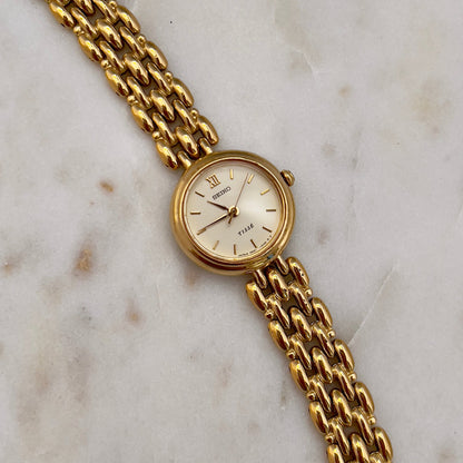 Seiko Tisse Gold Toned Women's Watch, wrist shot of a vintage women's watch at Gilded Hour.