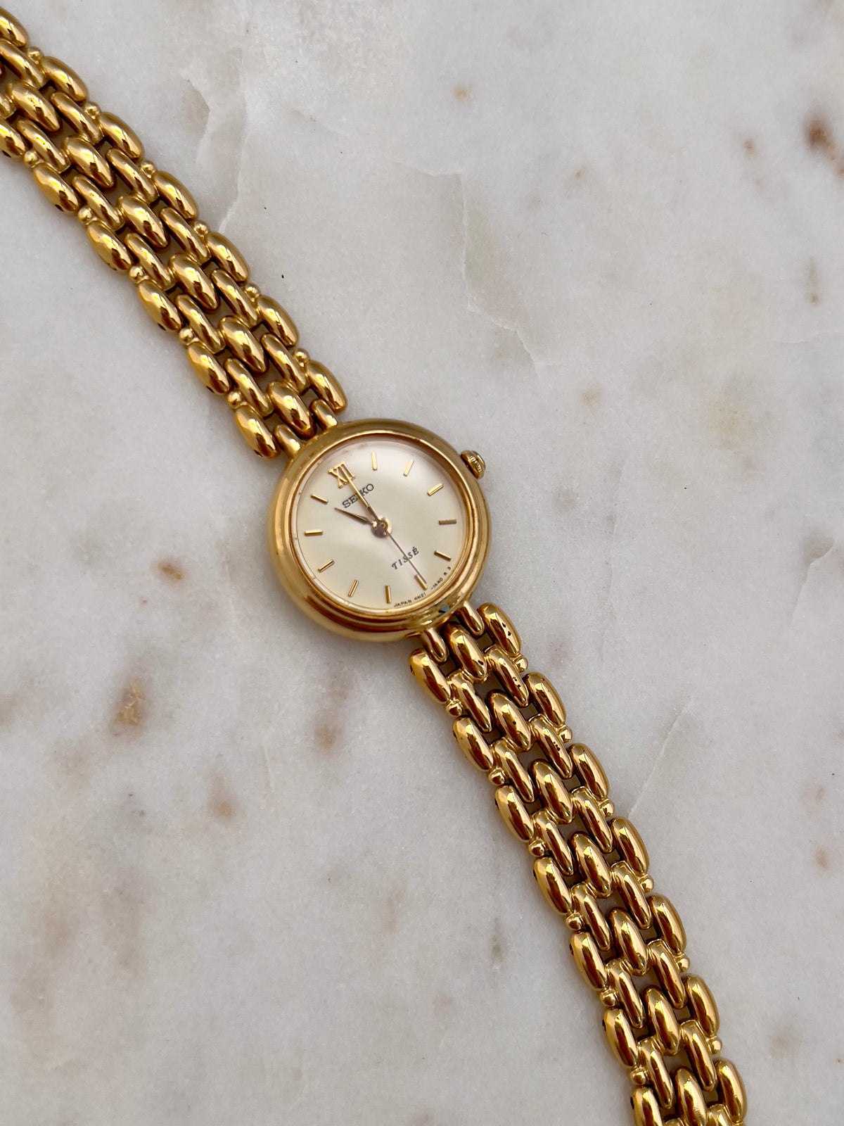 Seiko Tisse Gold Toned Women's Watch, caseback detail of a vintage women's watch at Gilded Hour.