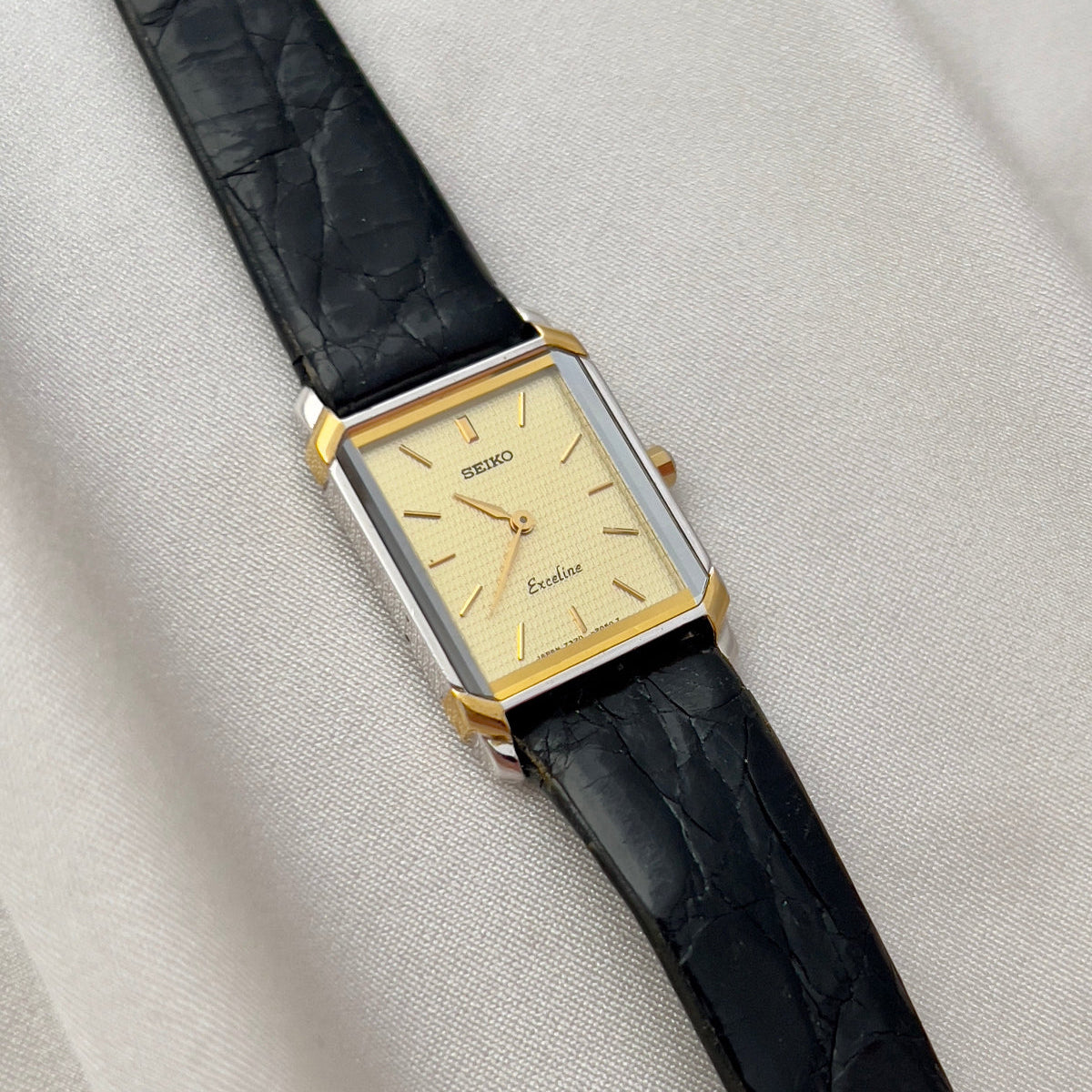 Seiko Exceline Tank Champagne Guilloché Dial Ladies Rectangular Watch, angled view of a vintage women's watch at Gilded Hour.