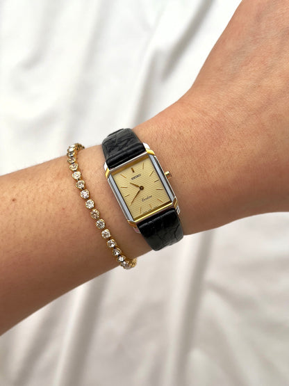 Seiko Exceline Tank Champagne Guilloché Dial Ladies Rectangular Watch, front view of a vintage women's watch at Gilded Hour.
