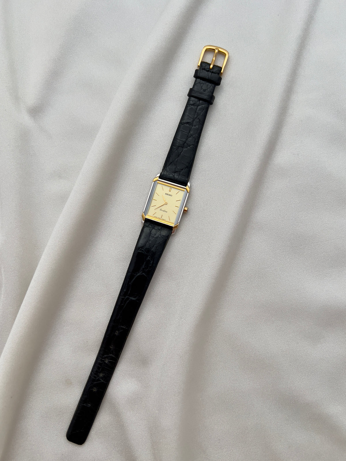 Seiko Exceline Tank Champagne Guilloché Dial Ladies Rectangular Watch, front view of a vintage women's watch at Gilded Hour.