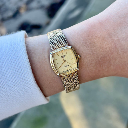 Seiko Exceline Gold Toned Cushion Woman's Watch, bracelet detail of a vintage women's watch at Gilded Hour.