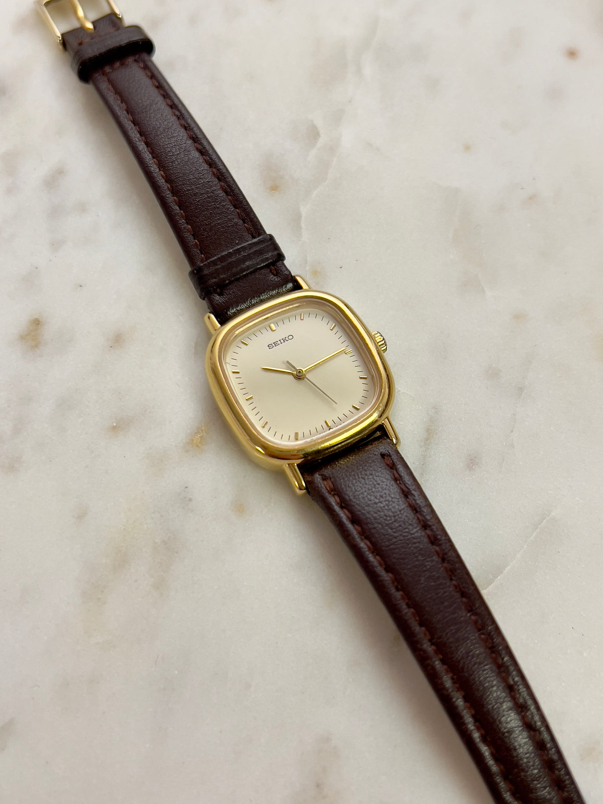 Seiko Gold Toned Cushion Case Woman's Watch, bracelet detail of a vintage women's watch at Gilded Hour.