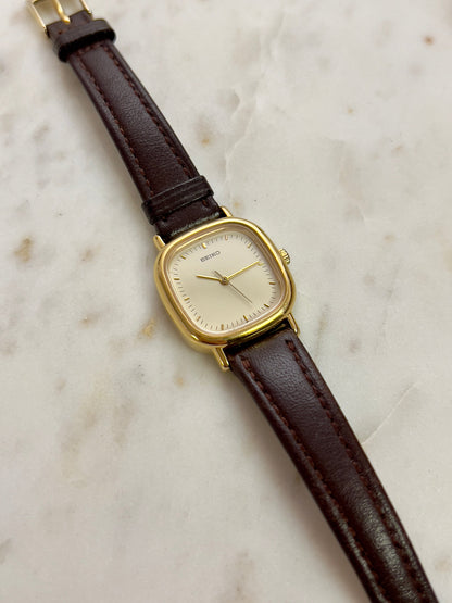 Seiko Gold Toned Cushion Case Woman's Watch, bracelet detail of a vintage women's watch at Gilded Hour.