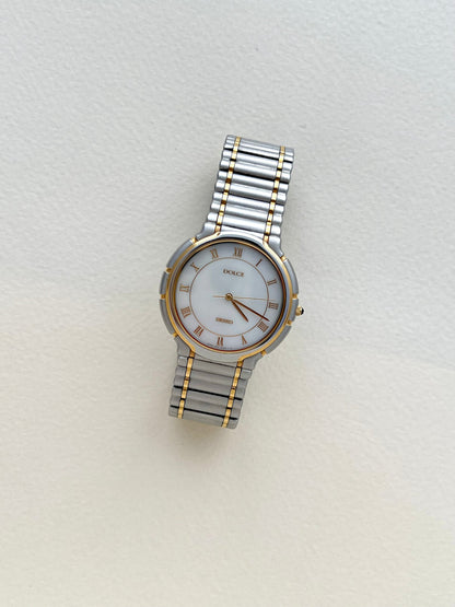 Seiko Dolce two-tone mother-of-pearl ladies watch, dial close-up.