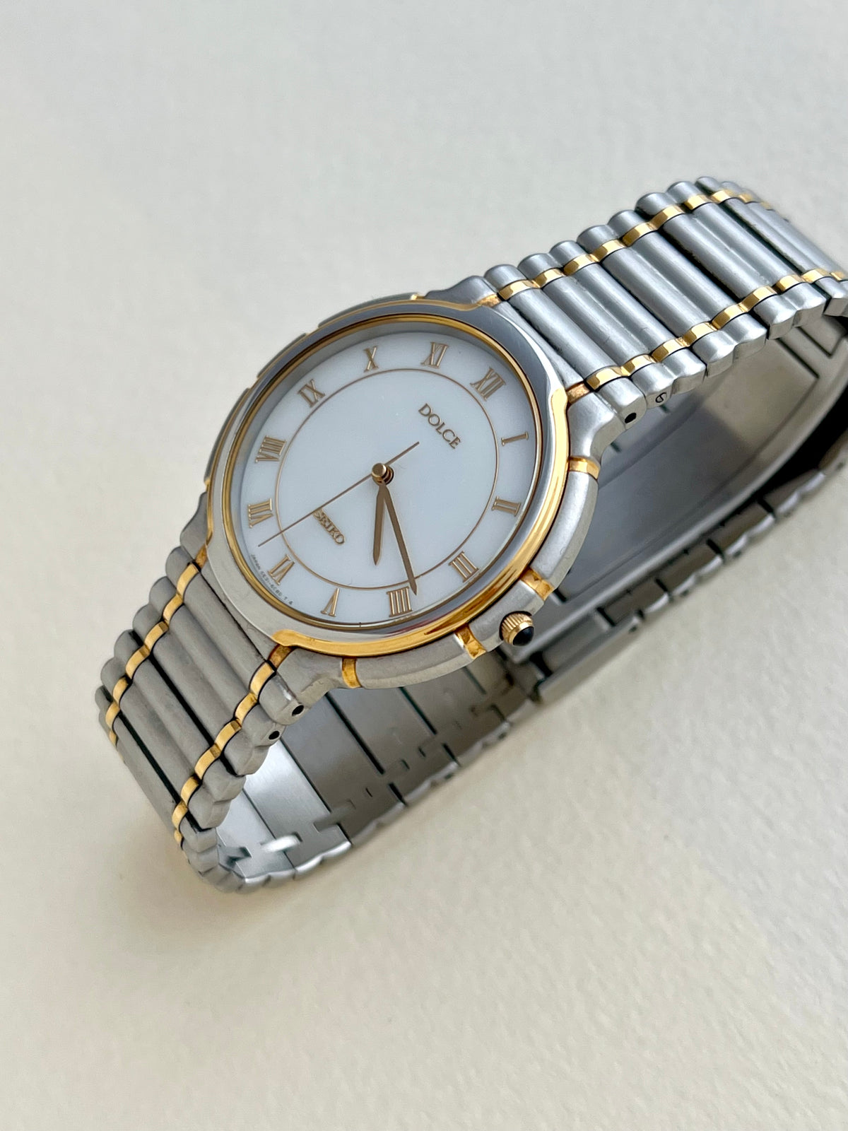 Seiko Dolce two-tone mother-of-pearl ladies watch, angle.