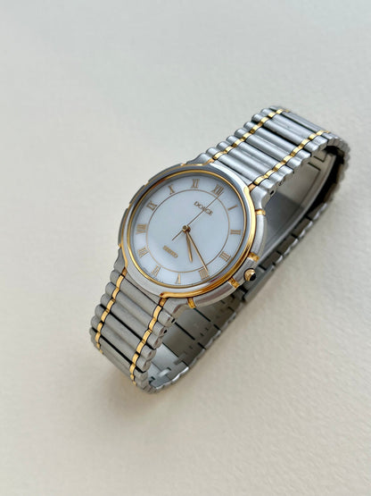 Seiko Dolce two-tone mother-of-pearl ladies watch, wrist.
