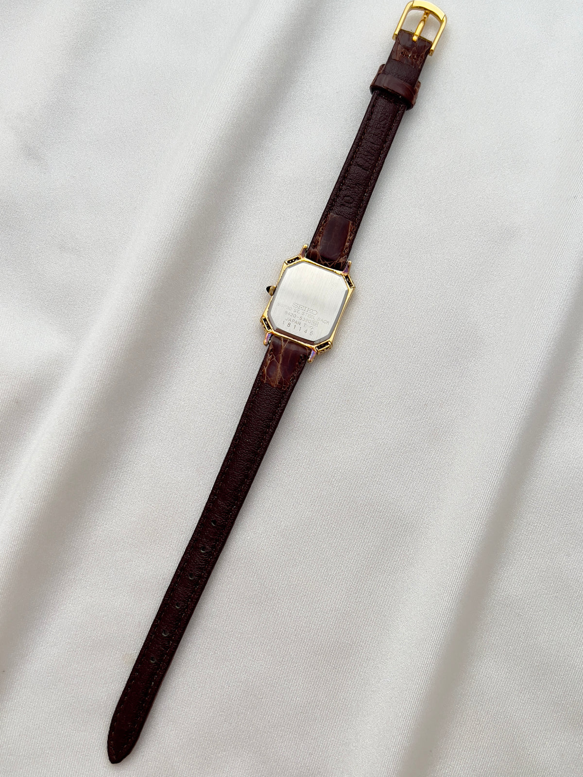 Seiko Exceline Gold Tank Ladies  Watch with Unique Ornate Case, angled view of a vintage women's watch at Gilded Hour.