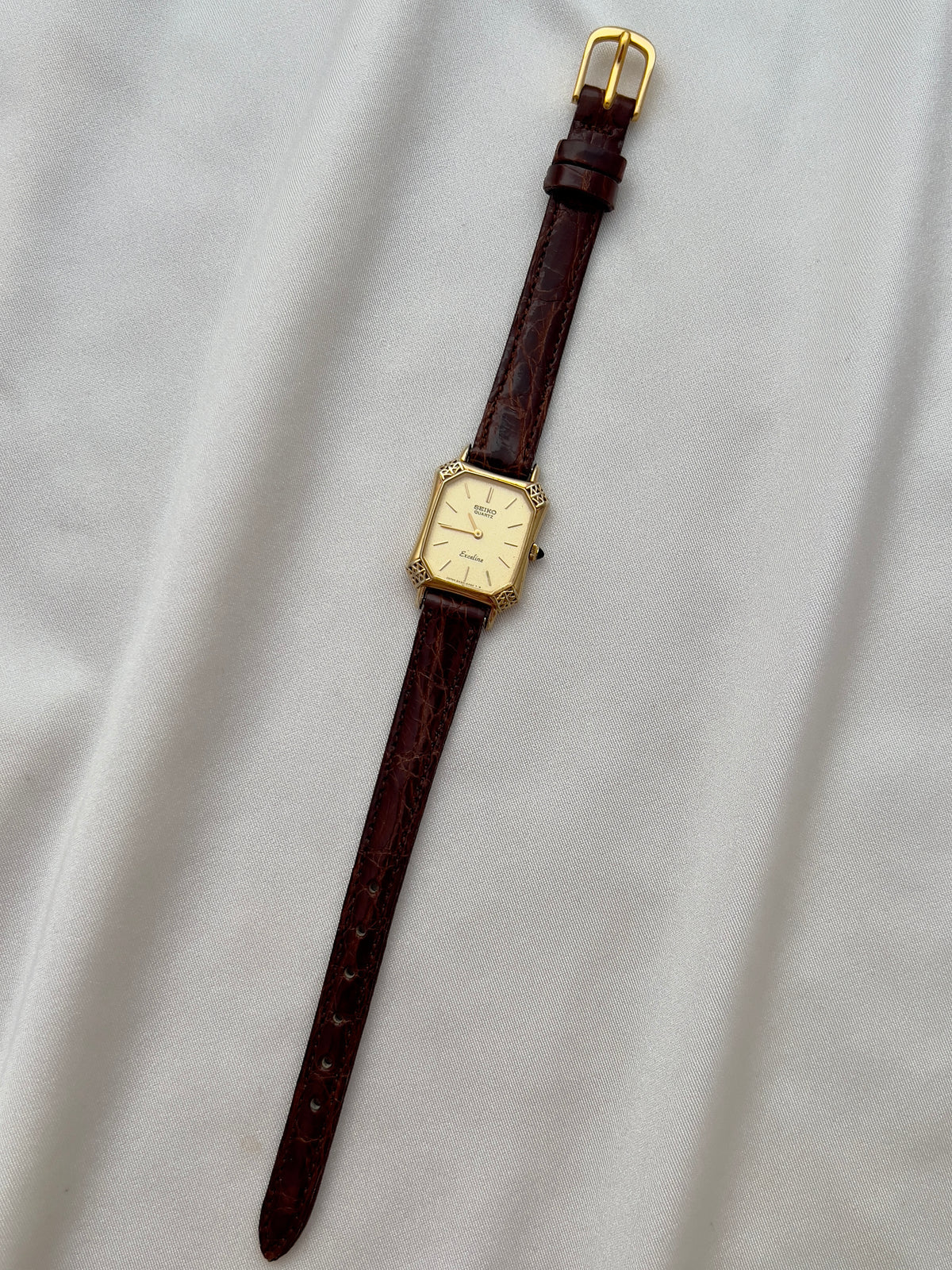Seiko Exceline Gold Tank Ladies  Watch with Unique Ornate Case, case profile of a vintage women's watch at Gilded Hour.