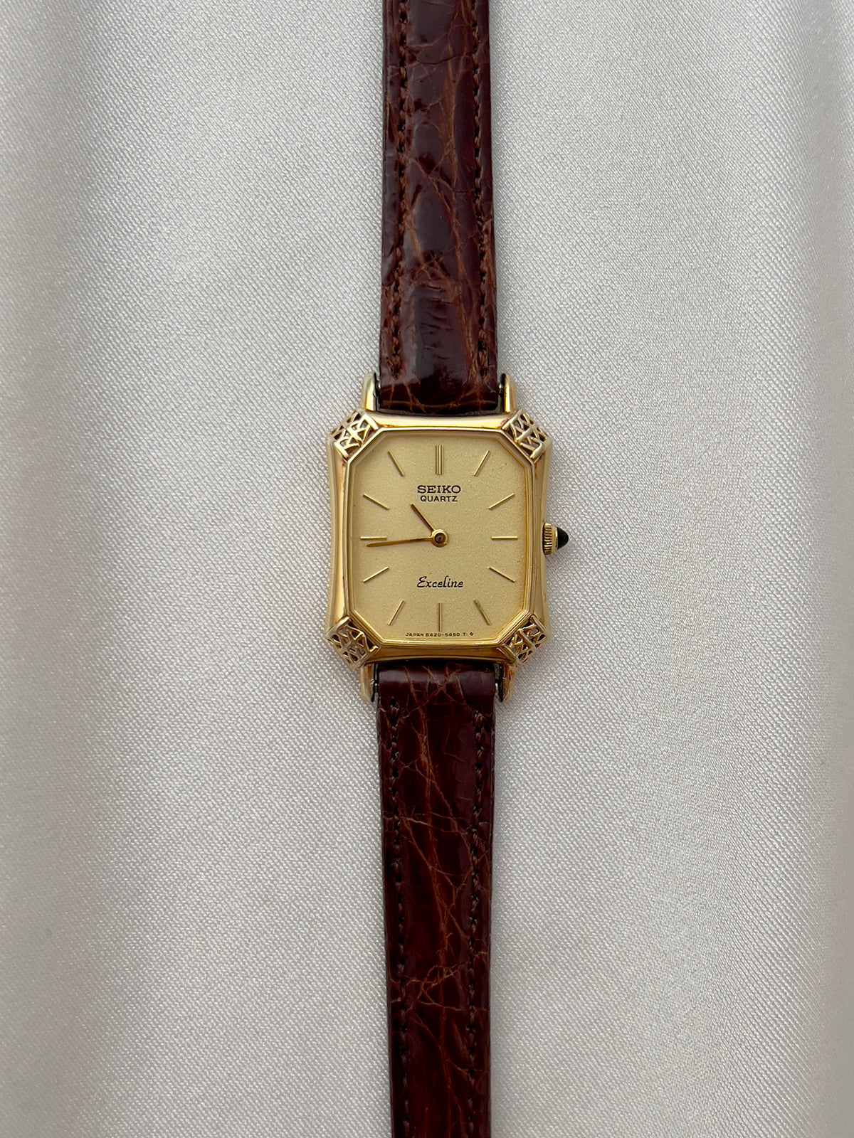 Seiko Exceline Gold Tank Ladies  Watch with Unique Ornate Case, caseback detail of a vintage women's watch at Gilded Hour.