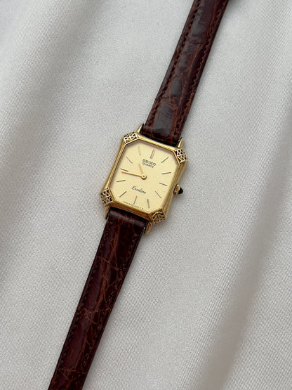 Seiko Exceline Gold Tank Ladies  Watch with Unique Ornate Case, dial close up of a vintage women's watch at Gilded Hour.
