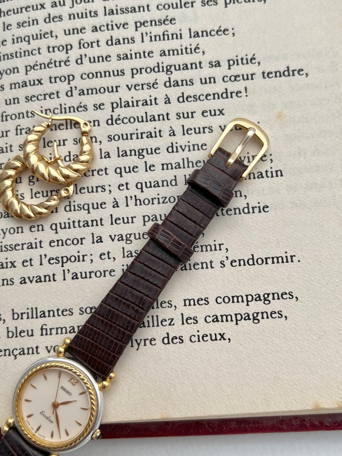 Seiko Two Toned Rope Bezel Woman's Watch — close-up of the dial and decorative gold bezel.