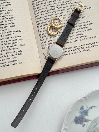 Seiko Two Toned Rope Bezel Woman's Watch — a different Seiko Exceline with a navy Roman numeral dial and two-tone bracelet.