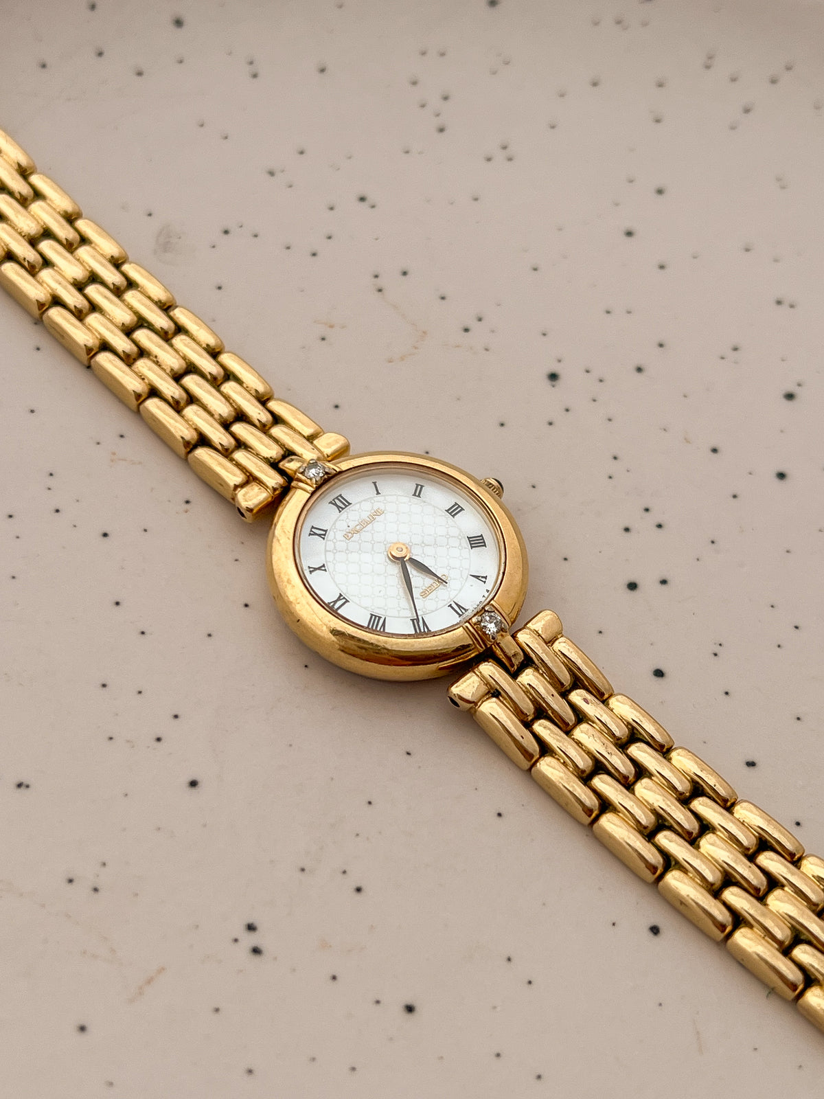 Seiko Exceline Roman Dial Gold Diamond Accent Women’s Watch, product view.
