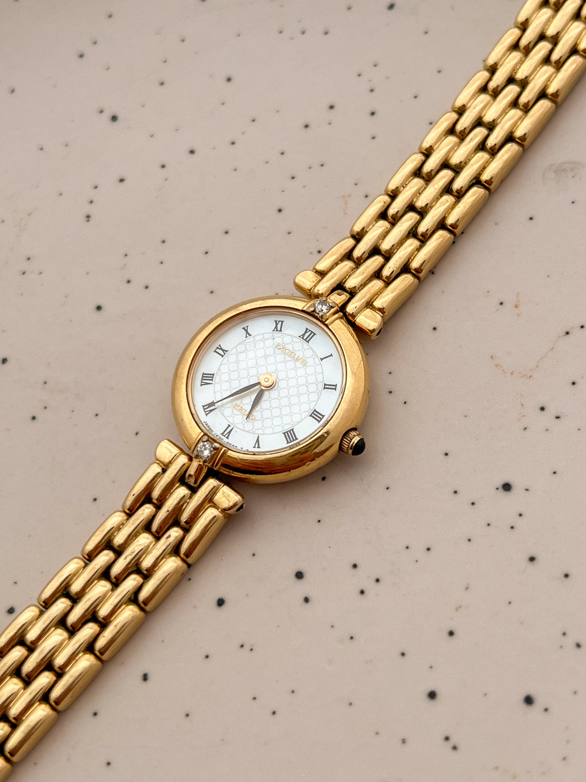 Seiko Exceline Roman Dial Gold Diamond Accent Women’s Watch, product view.