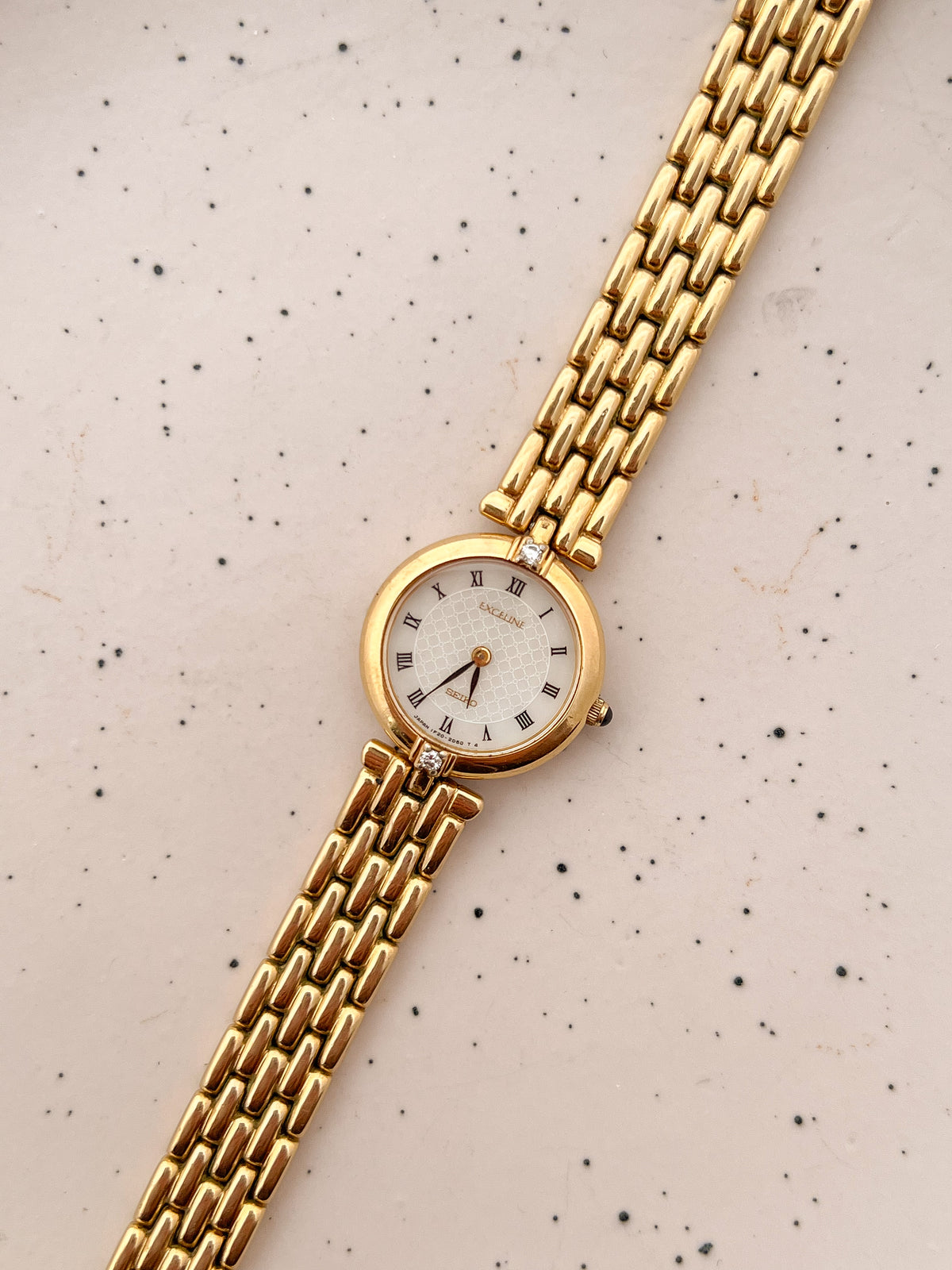 Seiko Exceline Roman Dial Gold Diamond Accent Women’s Watch, product view.
