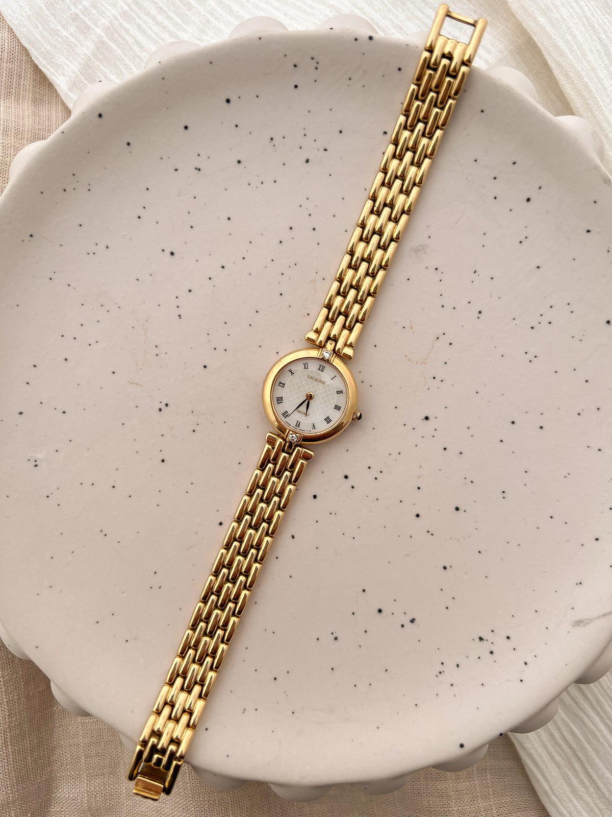 Seiko Exceline Roman Dial Gold Diamond Accent Women’s Watch, product view.