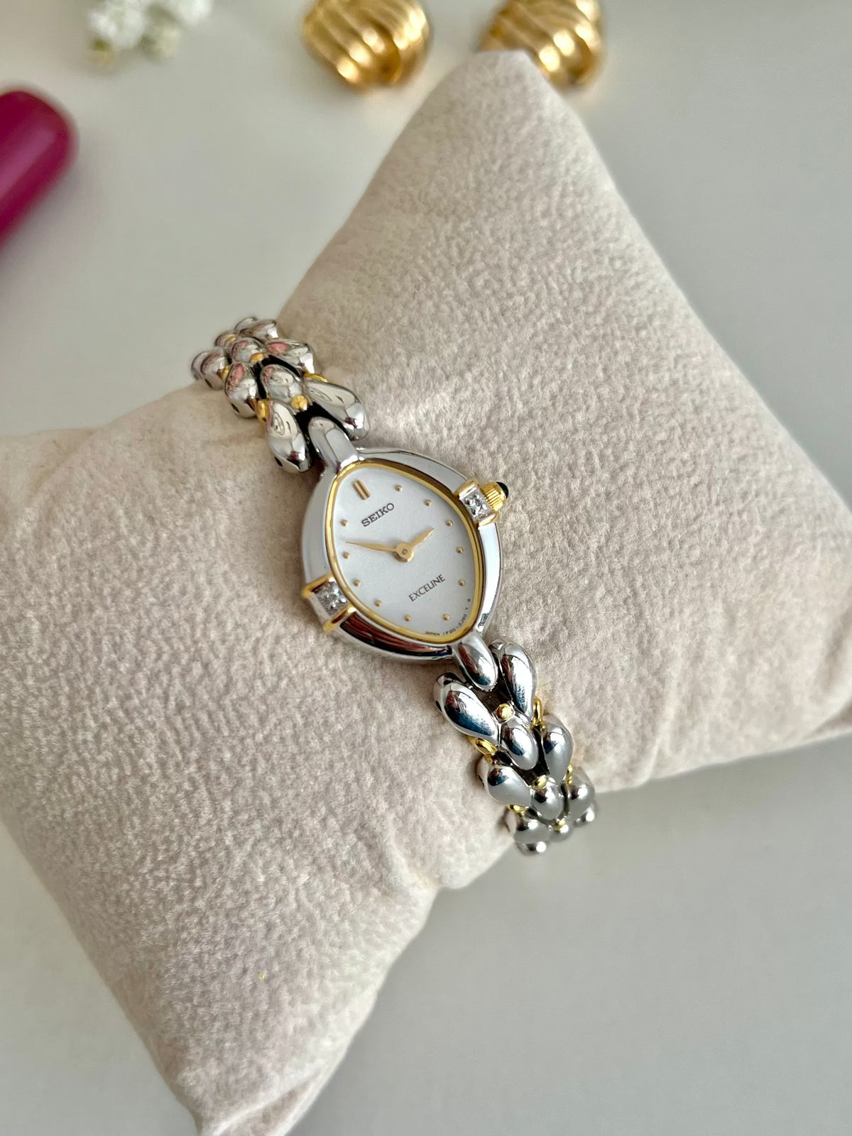 Seiko Exceline Diamond Mother of Pearl Women’s Watch, angled view of a vintage women's watch at Gilded Hour.