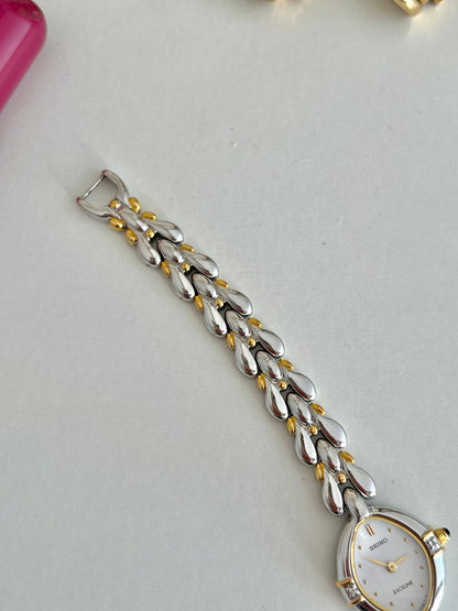 Seiko Exceline Diamond Mother of Pearl Women’s Watch, bracelet detail of a vintage women's watch at Gilded Hour.